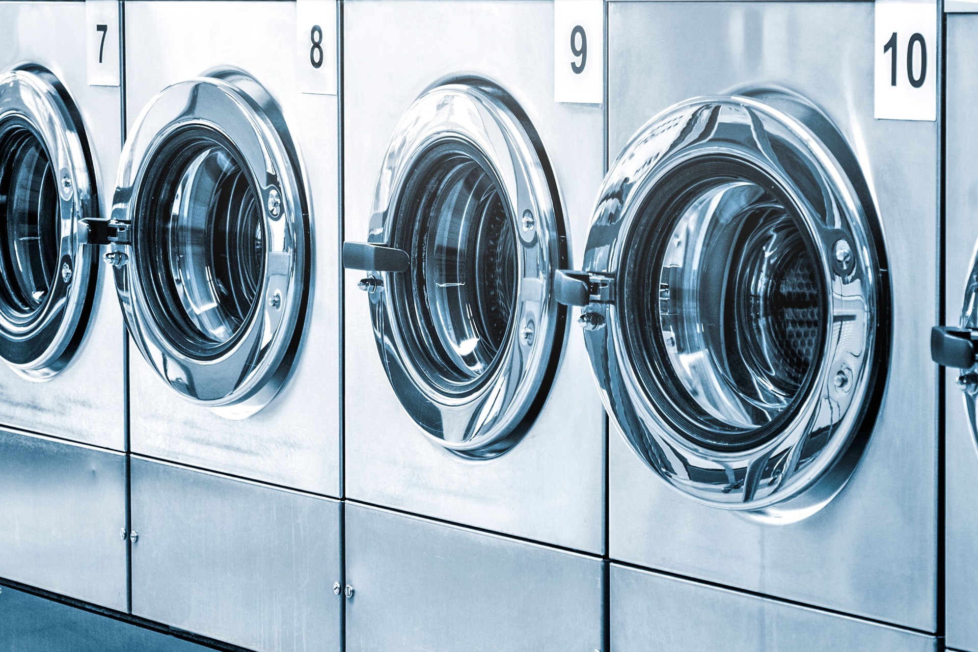 Industrial washing machines in a public laundromat
